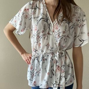 Floral faux wrap blouse